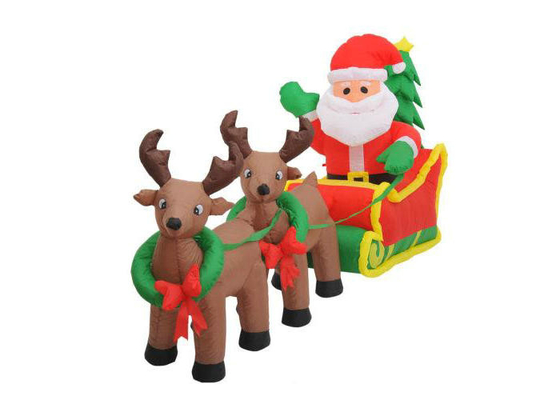 Decorações infláveis do feriado de Papai Noel com a linha dobro das renas costurada